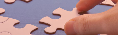 Mano con puzzle